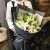 6枝白色多头百合(不少于15朵,至少盛开6朵),绿色桔梗间插丰满,尤加利间插点缀,白色雾面纸内衬,藏蓝色雾面纸外围,藏蓝色和银色丝带蝴蝶结束扎,