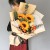3朵向日葵,2朵香槟玫瑰,1扎橙色多头玫瑰,尤加利间插点缀,白色雪梨纸内衬,蜜瓜/奶茶双面欧雅纸外围包装,黑色条纹丝带蝴蝶结束扎,
